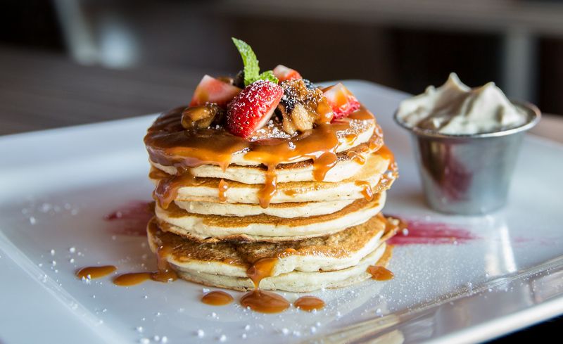 Strawberry crepe with caramel syrup and mint